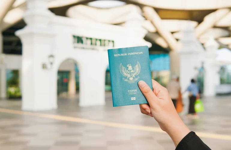 Girl_Holding_Passport